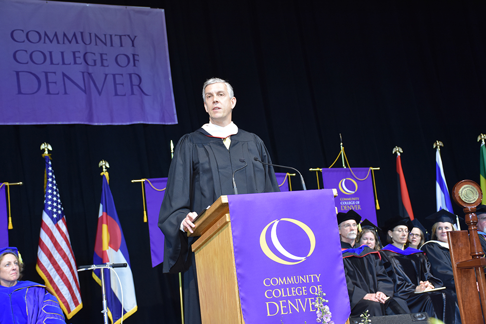 CCD commencement speaker at podium