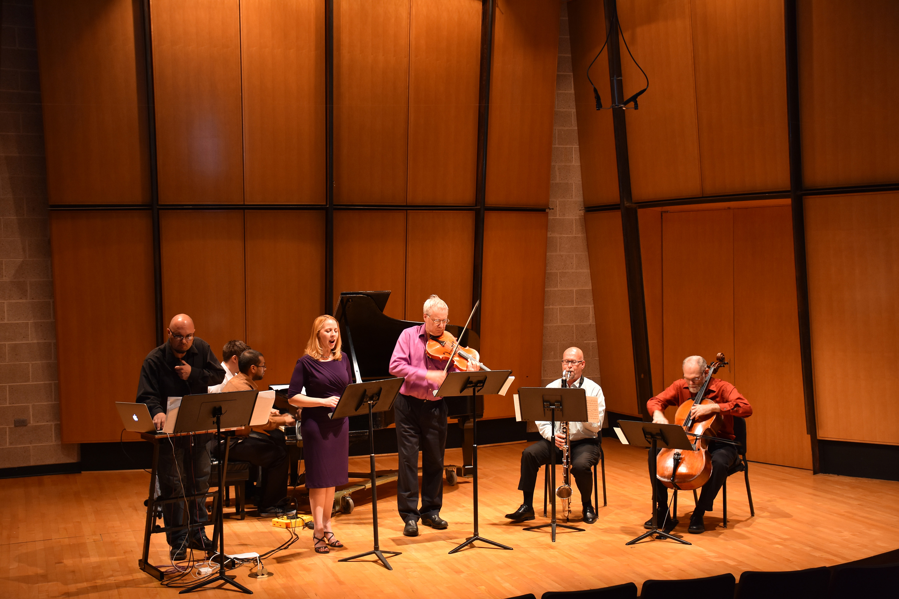 CCD Faculty Bob Studinger, Arijit Chakraborty, Cathleen Whiles, Megan Buness, Conrad Kehn, Brian Ebert perform together on stage at the King Center musicians on stage performing together