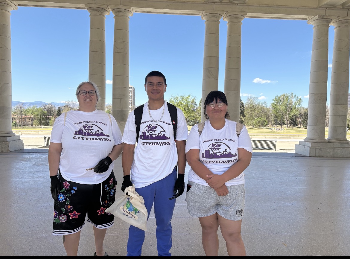 3 CCD Students in a white tee shirt at cheesman park