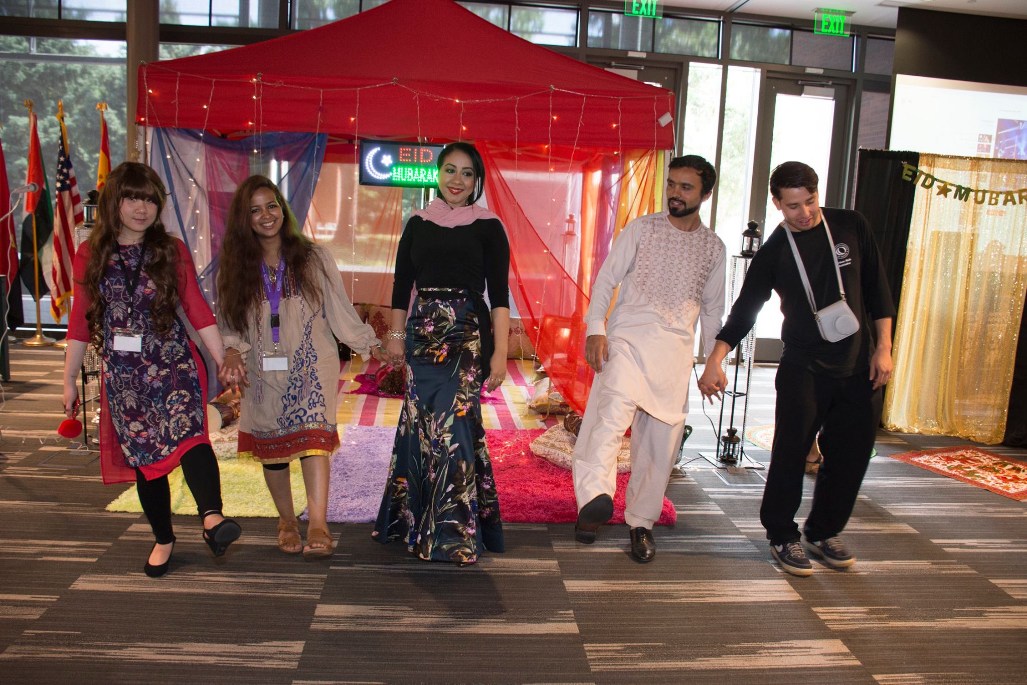 CCD Celebrates Eid-al-Fitr 5 students standing together smiling