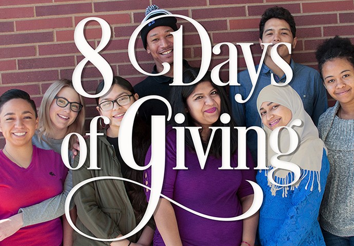 group of people gathered with text "8 days of giving" 