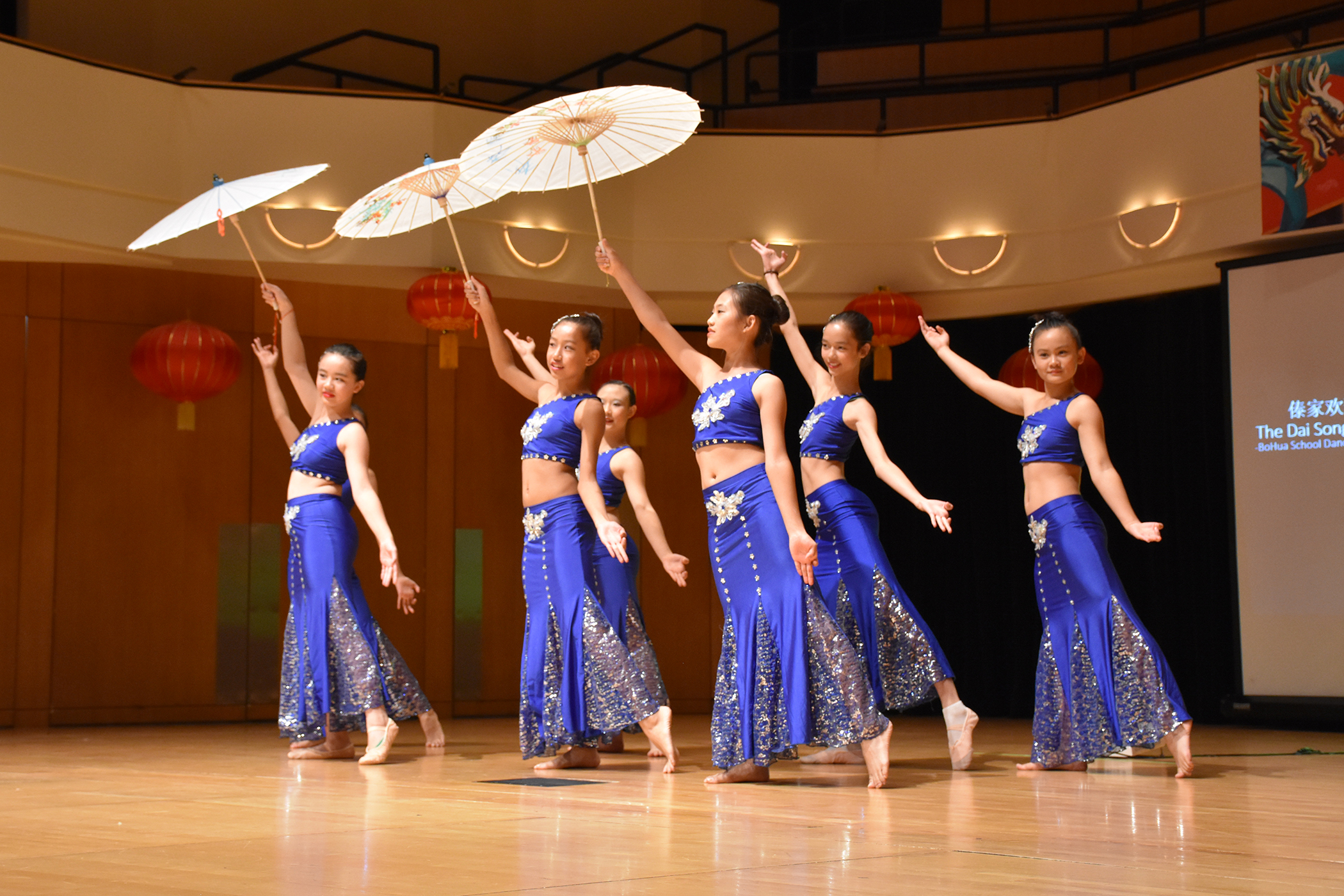 women performing from a Chinese dance academy