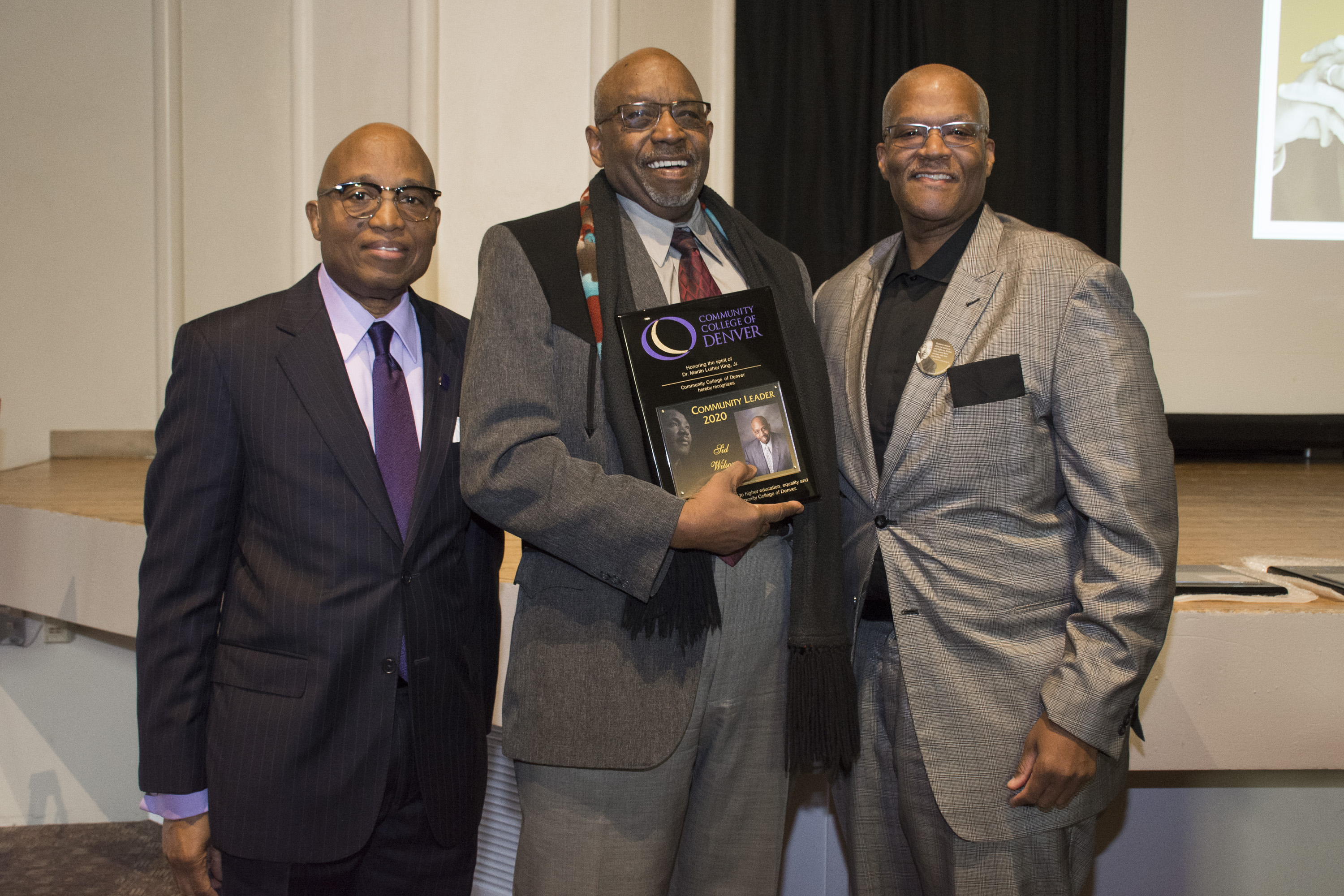 Community Leader award recipient Sid Wilson with CCD President Everette Freeman and Kevin Williams.