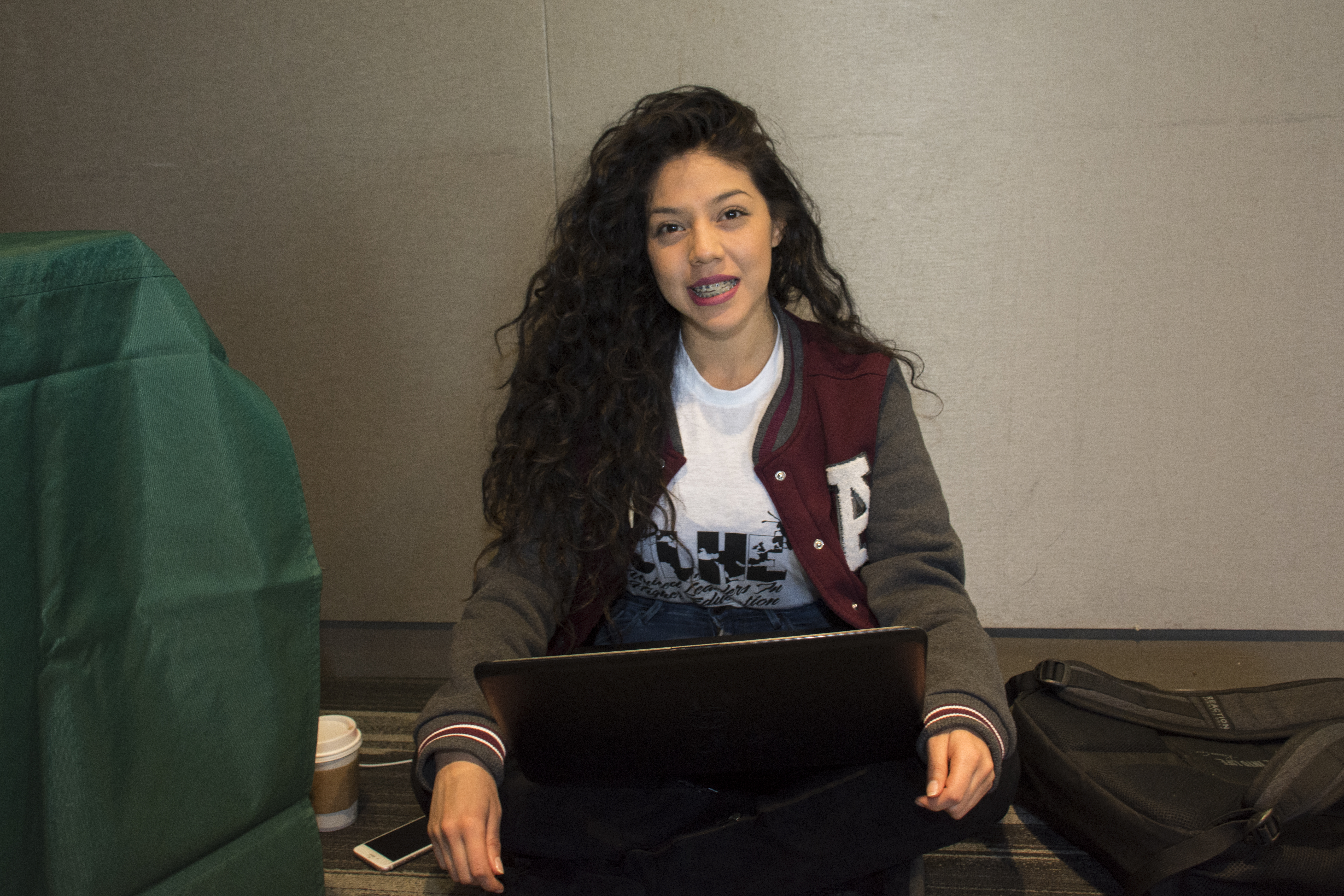 Student attending DREAMers event. women with laptop