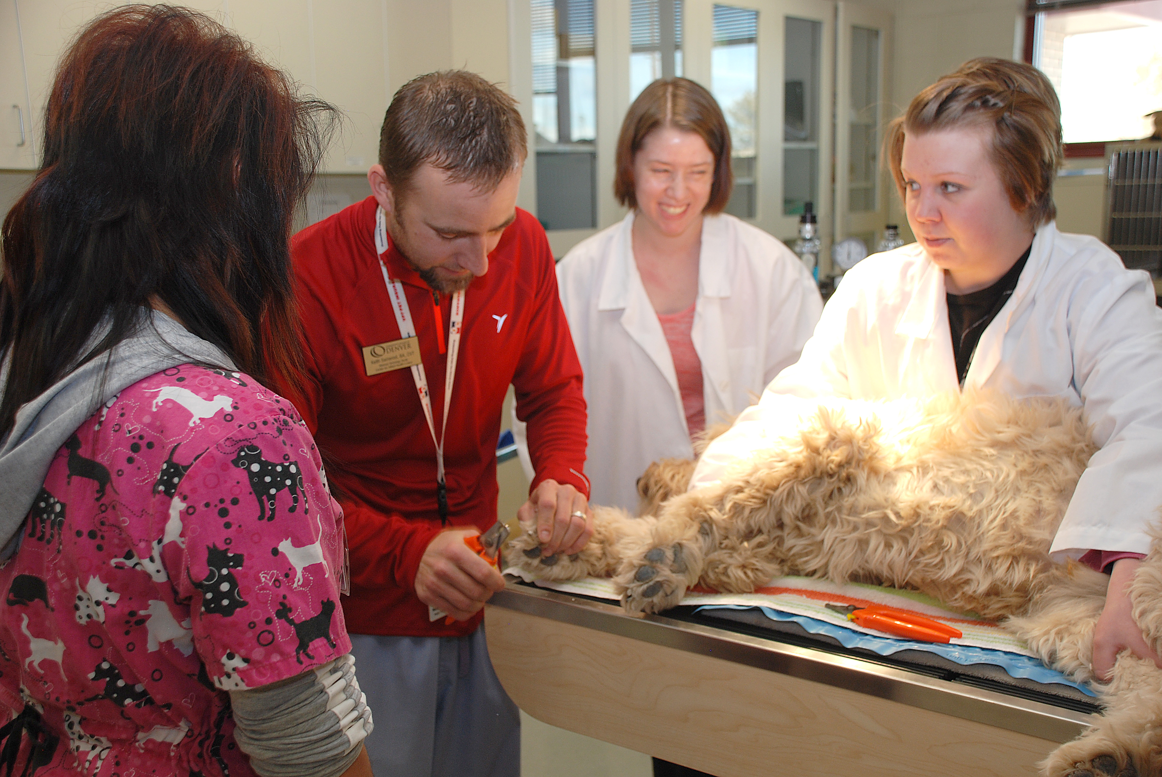 photo of vet tech students with instructor