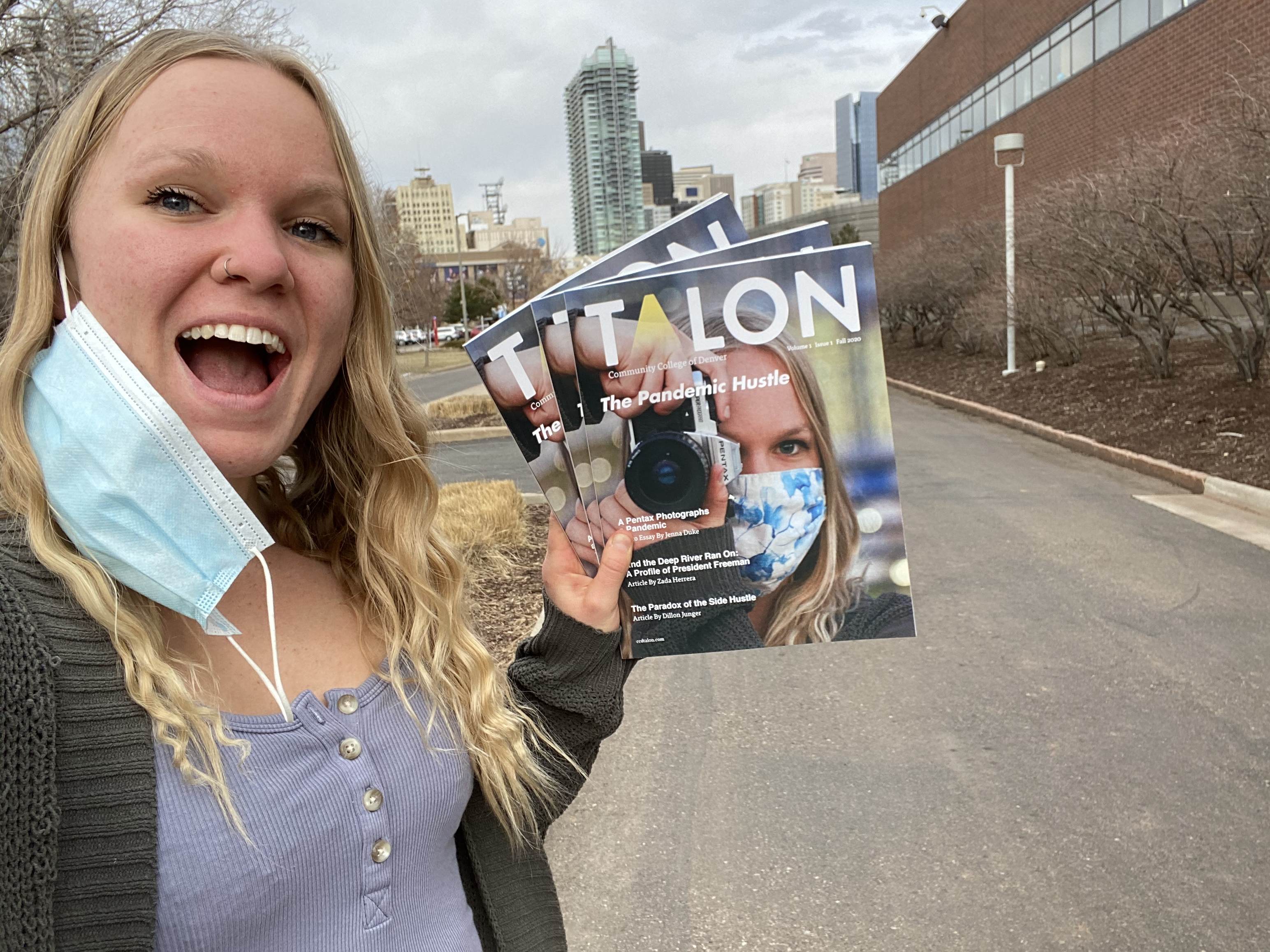 ccd student Jenna Duke hold a copy of the talon