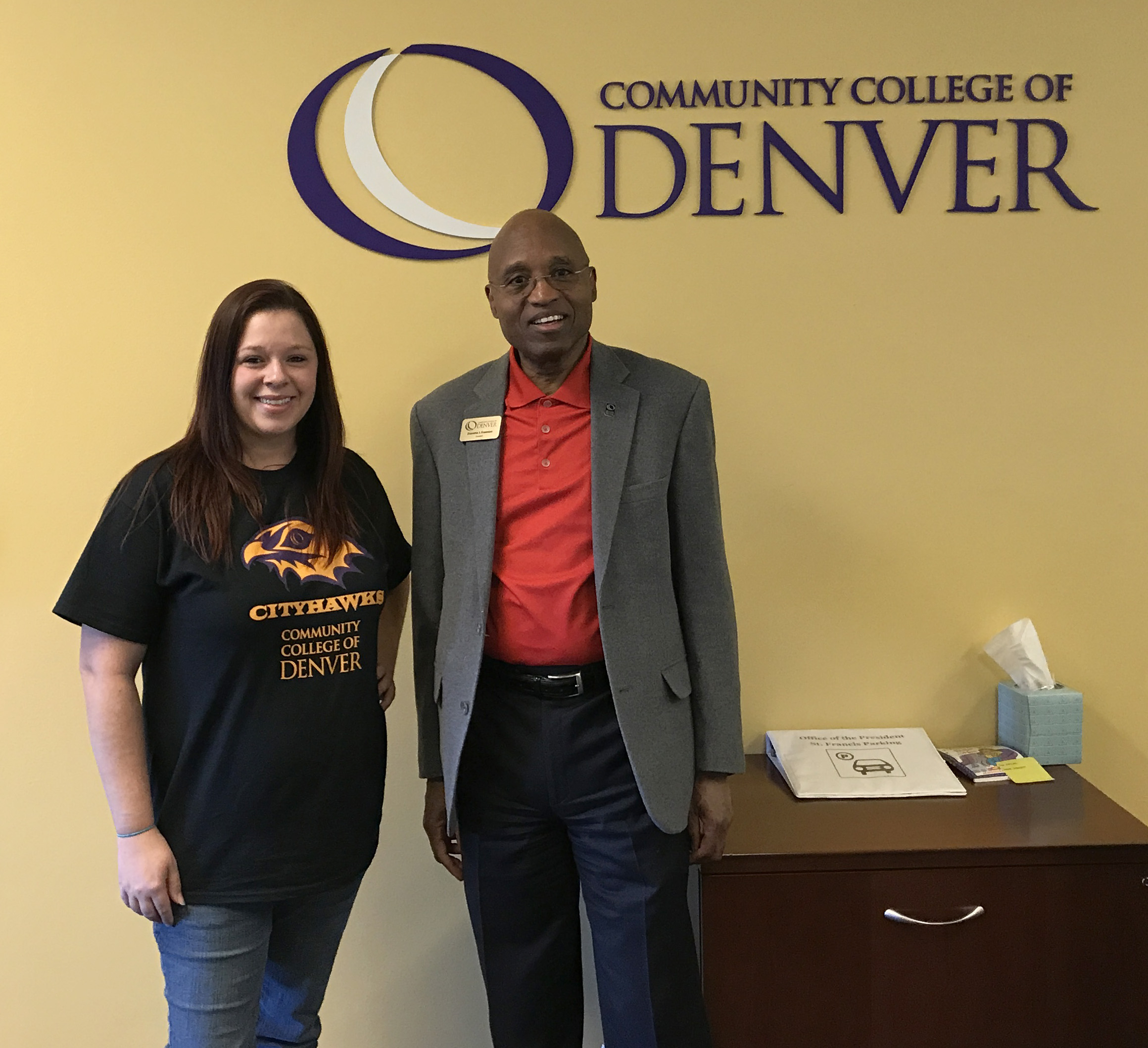 girl in college t-shirt with college president