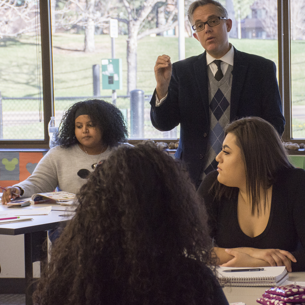 CCD instructors are dedicated to student success. CCD instructor with students