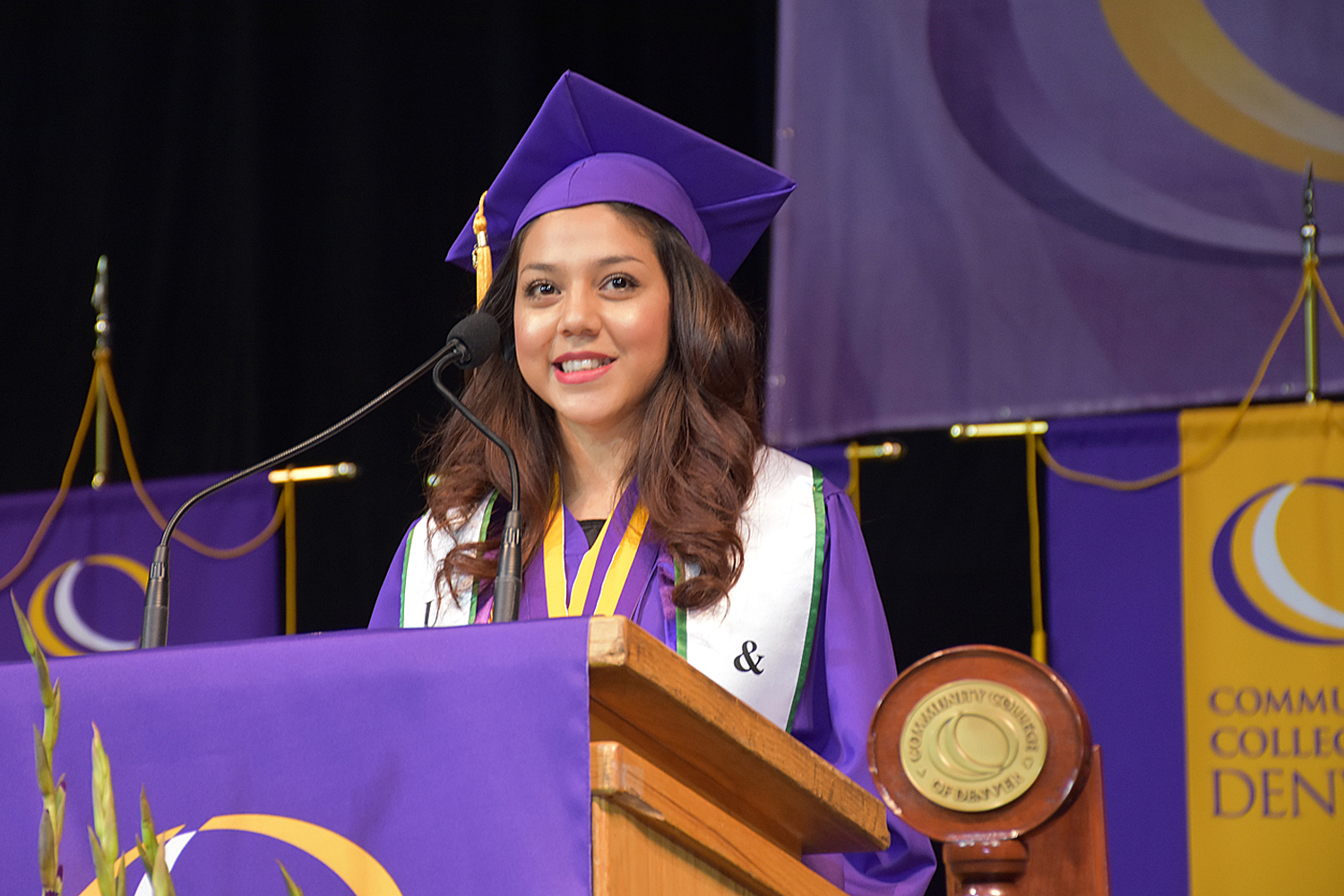 CCD honor student giving a speech during Commencement