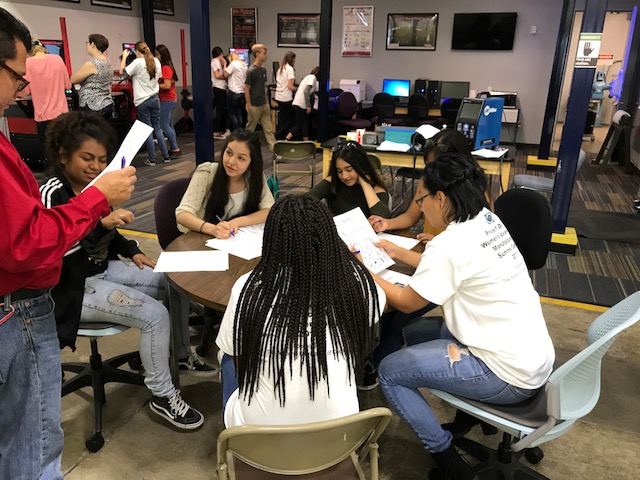 group of students at a round table