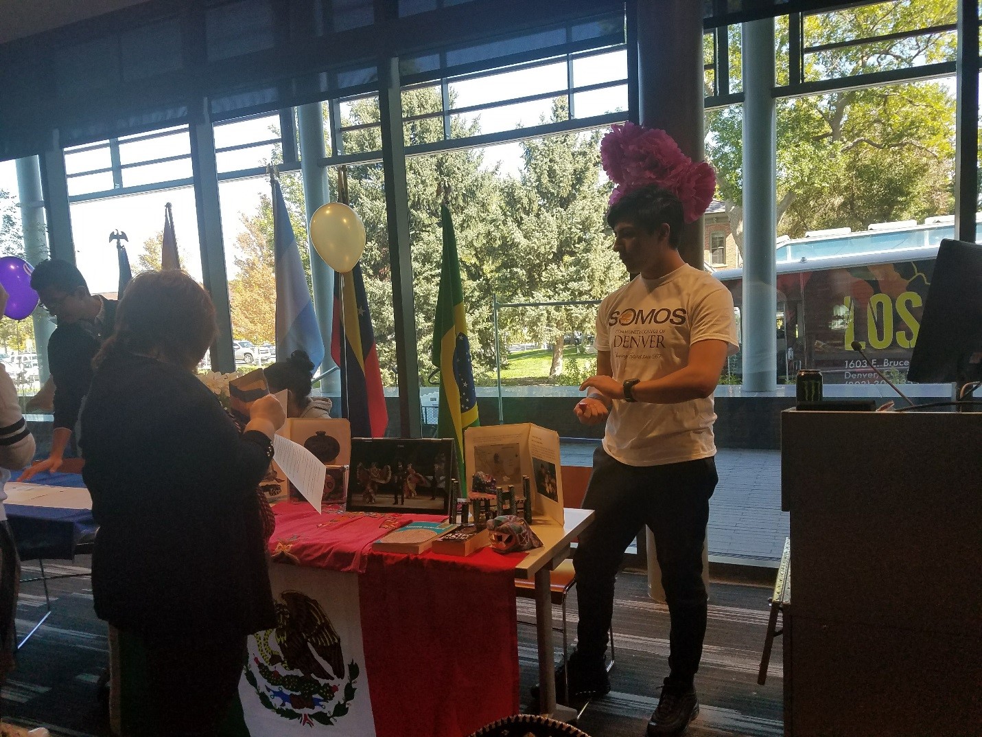 One student at Mexico table for Somos CCD Mexico represented at the CCD Somos Event