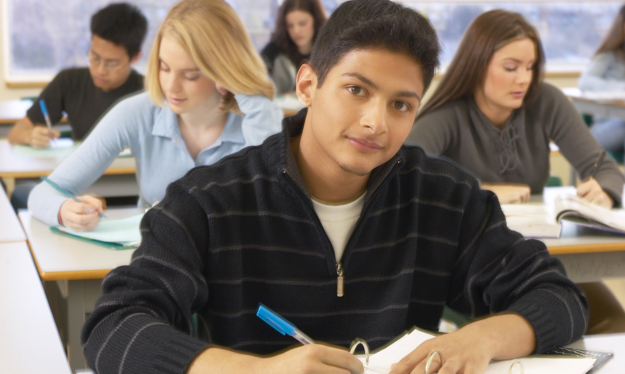 A young student taking a test