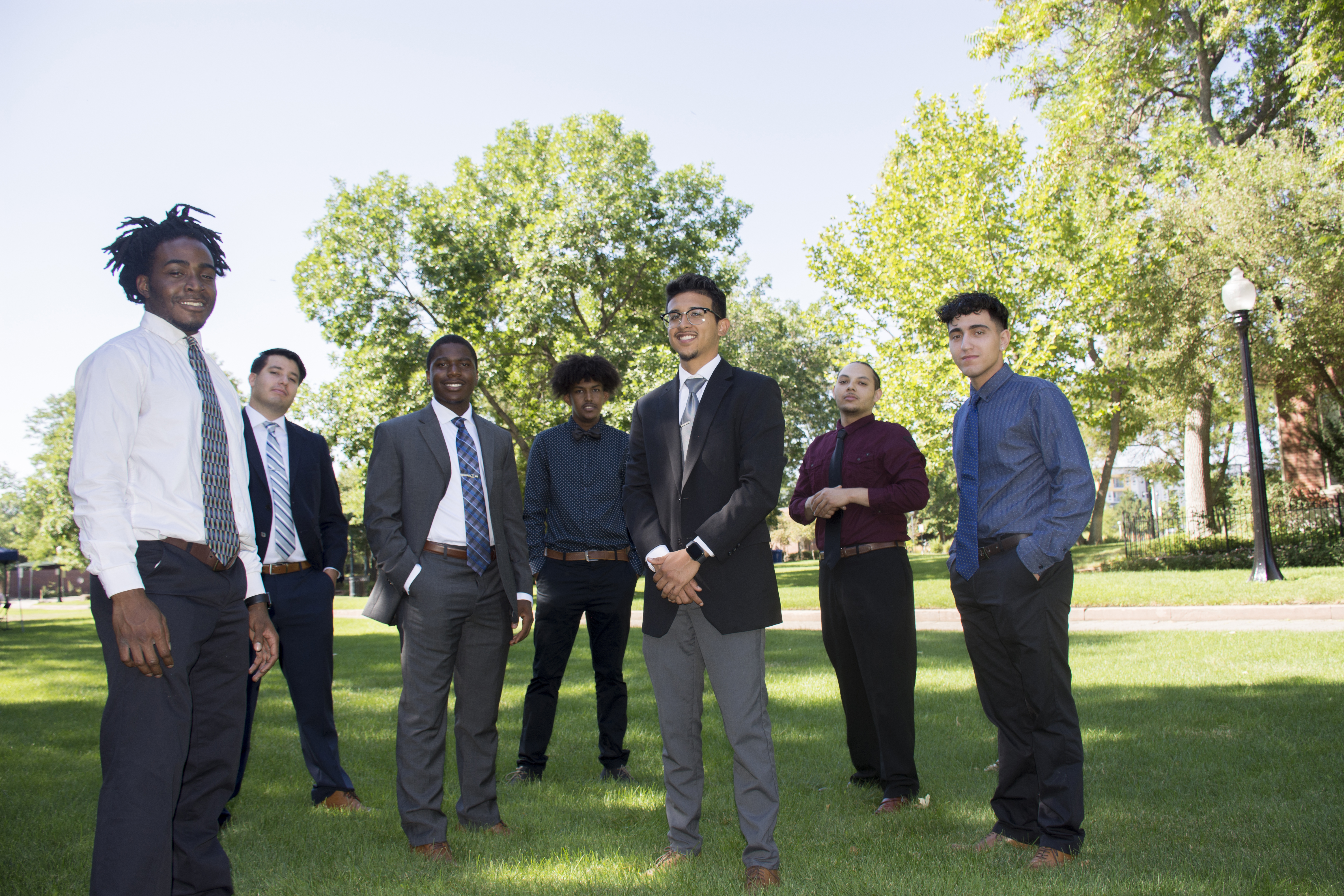 UMI members standing outside on the grass