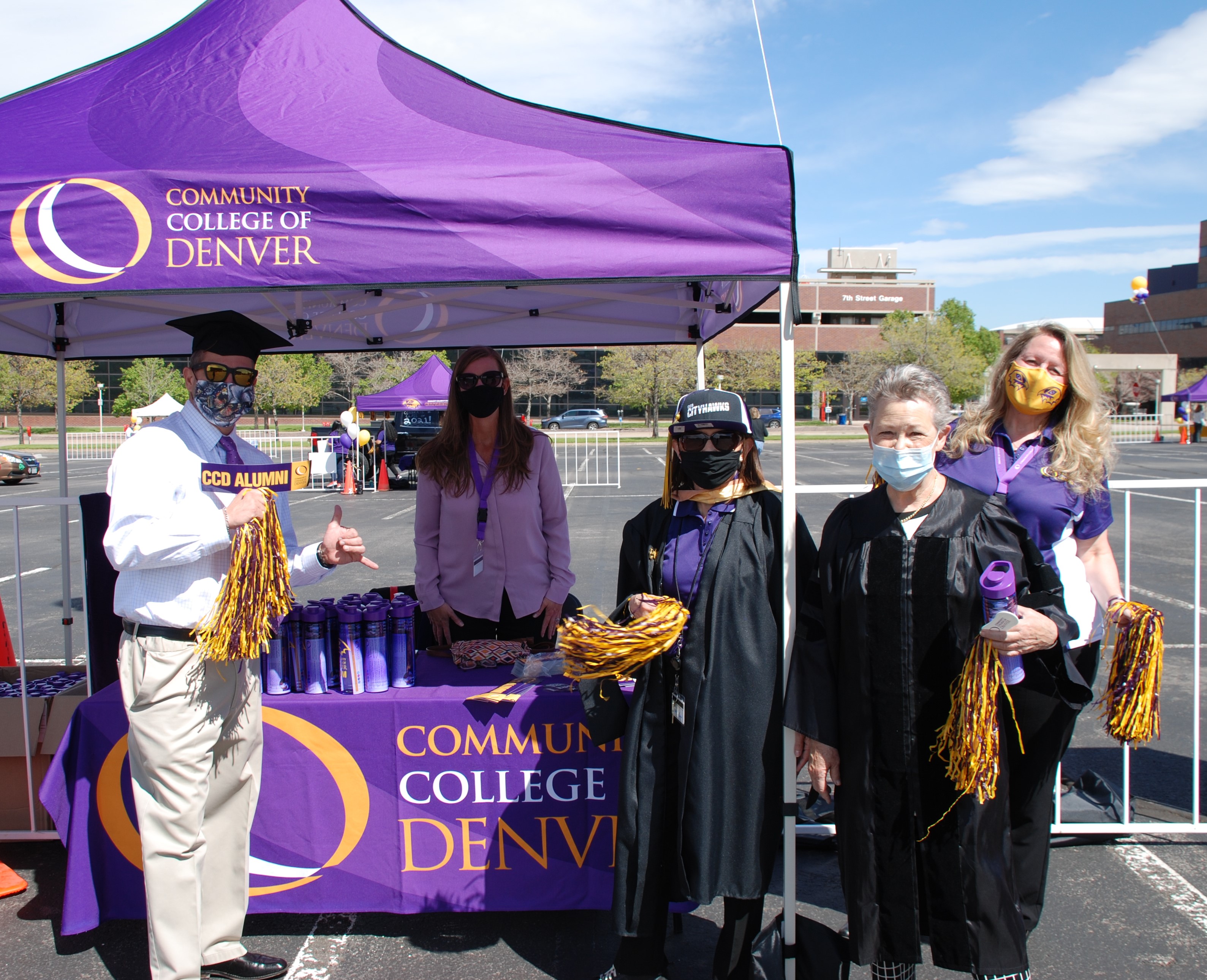 Foundation Board Members and staff in Alumni booth at graduation