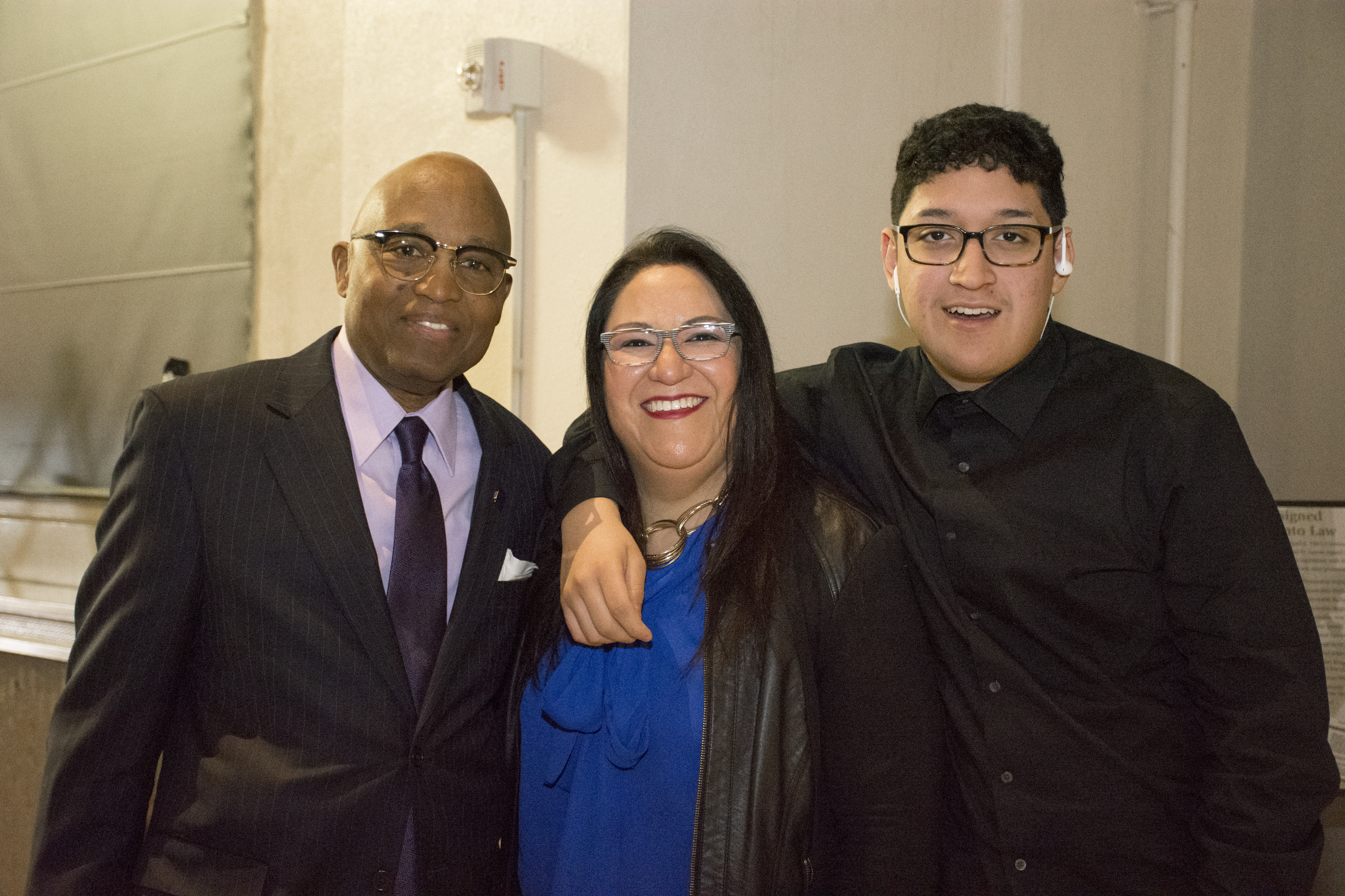 CCD President Everette Freeman takes a photo with MLK celebration attendees.