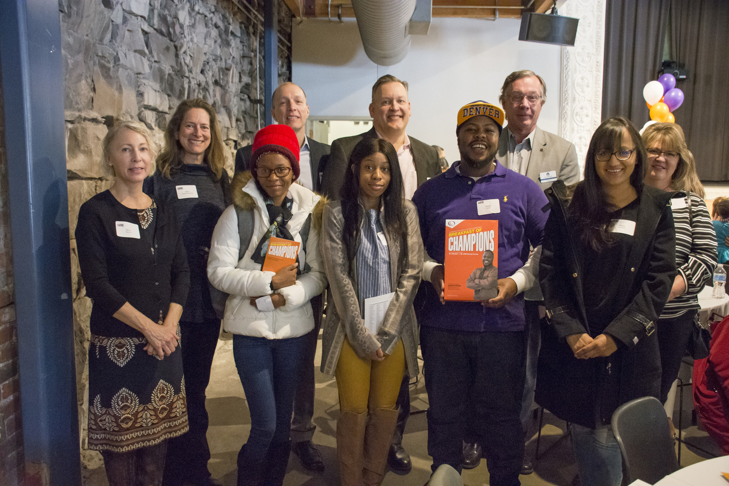 Hide in Plain Sight employees with CCD scholarship recipients group of scholarship students with donors