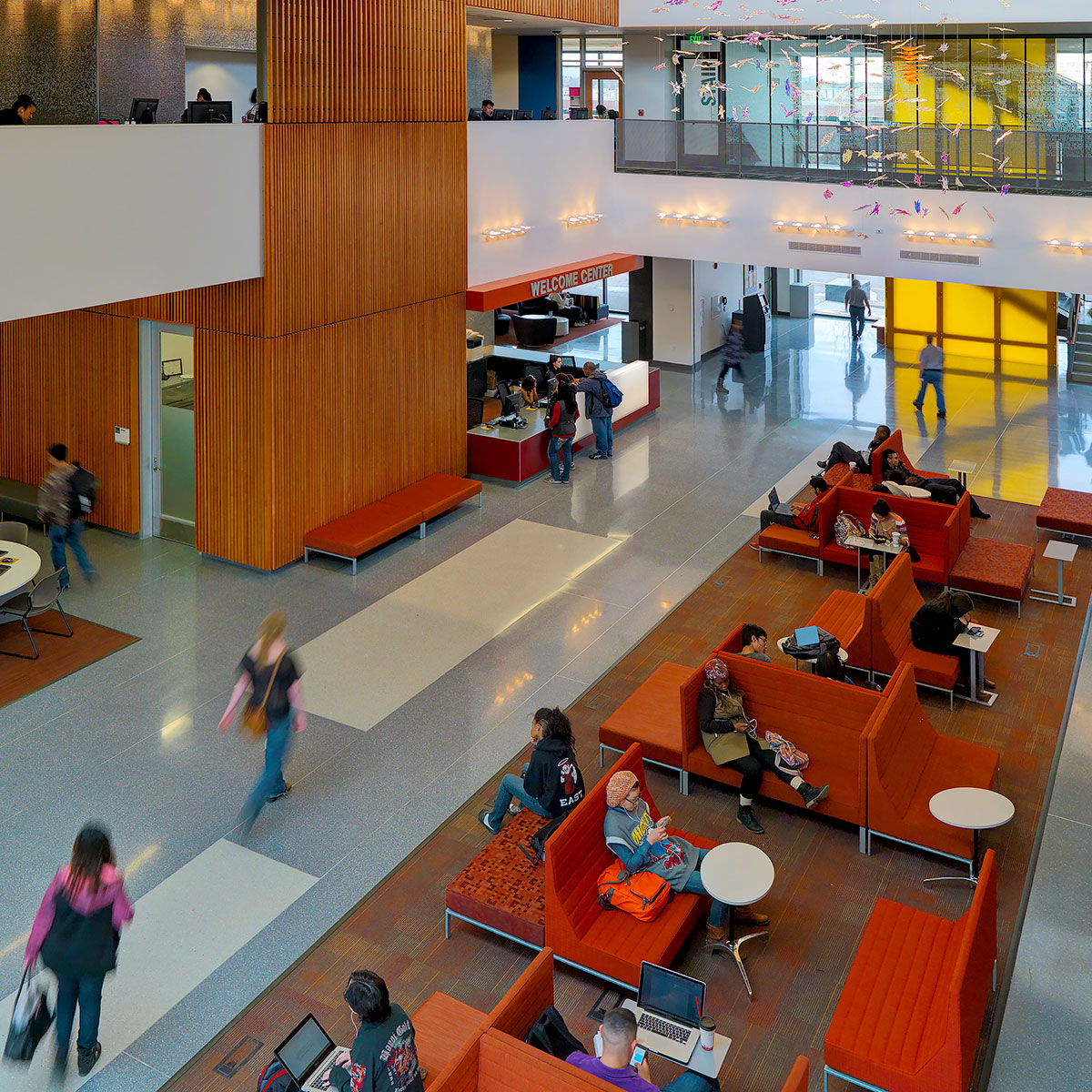 Building lounge with students studying