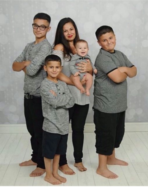 CCD student, Felicia Ortega with her children. woman with her children