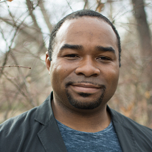 headshot of smiling man