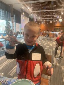 boy showing off his painted fingers