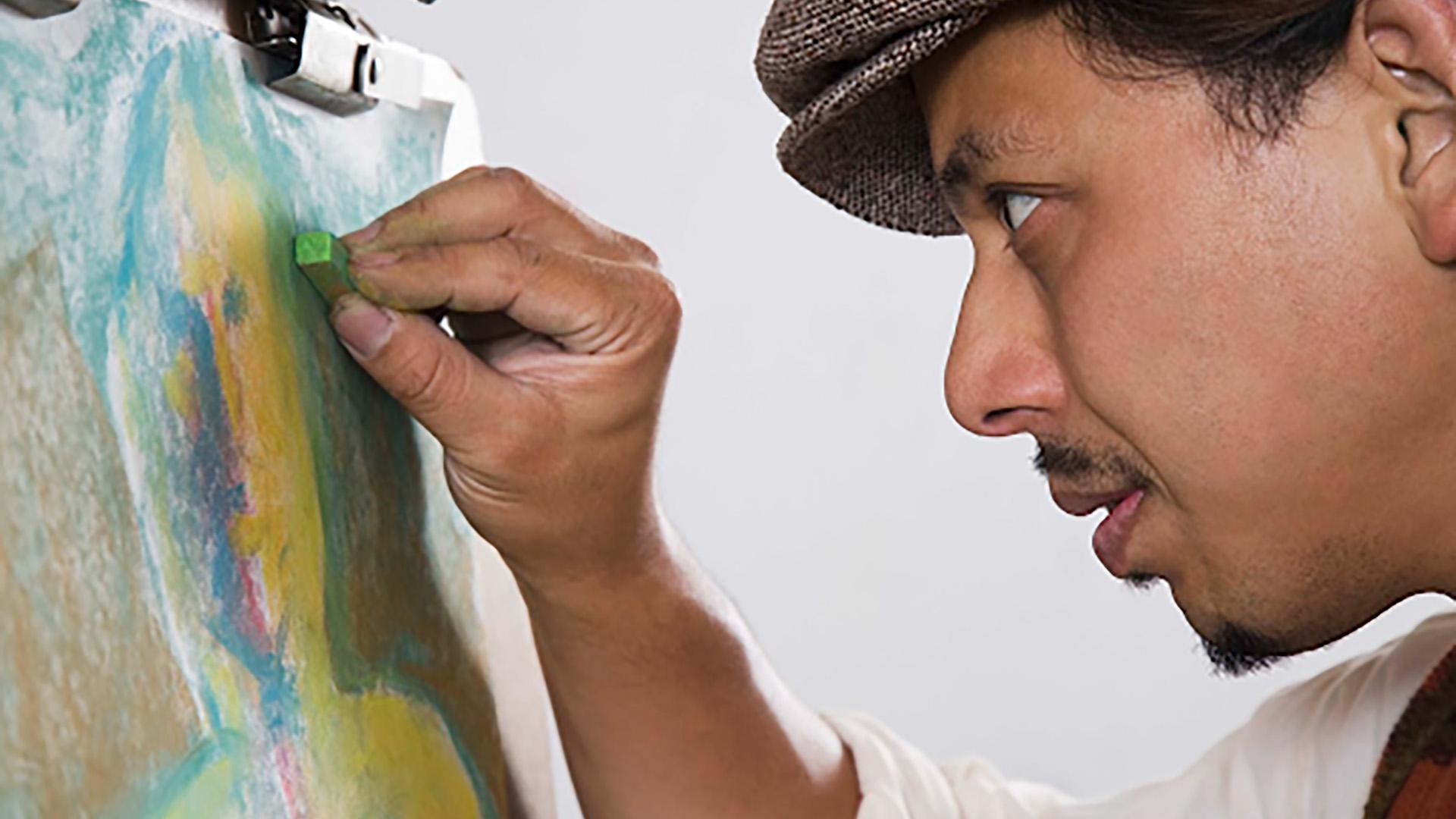 Man using pastels