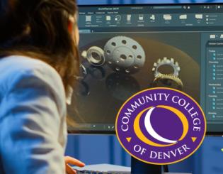 Person with brown shoulder length wearing a blue shirt looking at a computer screen. Community College of Denver logo