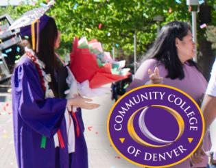 Student wearing purple commencement regalia and holding flowers. A woman wearing a purple shirt stands next to the student. 