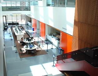 University hallway with tables and seats 