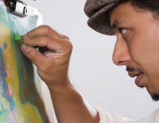 Man using pastels