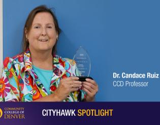 Image of Dr Candace Ruiz accepting an award with a blue background 