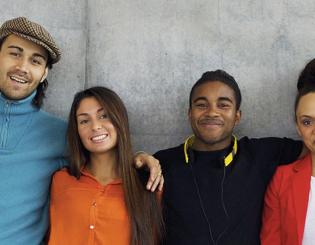 4 students smiling