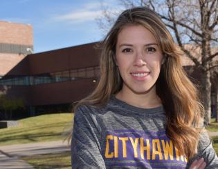 young woman in cityhawk tshirt