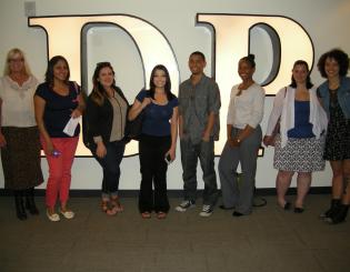 Students in front of The Denver Post sign