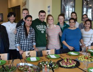 Group Shot of CCD Nutrition Students standing in front of the dishes they have prepared