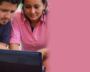two people on a computer