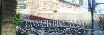 Cannabis dispensary sign on retail window
