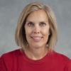 Smiling woman in a red shirt