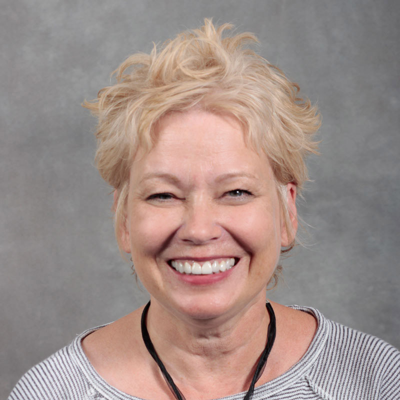 Blonde woman with a striped shirt